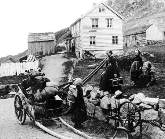 https://www.squamishreporter.com/wp-content/uploads/2013/10/Family-leaving-for-America-Western-Norway-1890_Norsk-Folkemuseum-540x453.jpg