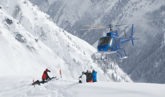 https://www.squamishreporter.com/wp-content/uploads/2024/01/heliskiing-540x318.png