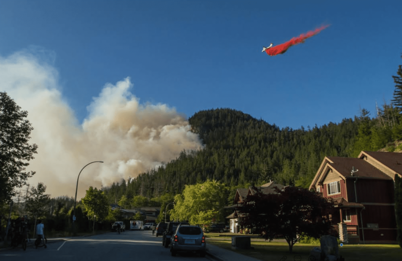 Helicopter dousing fire in Squamish.