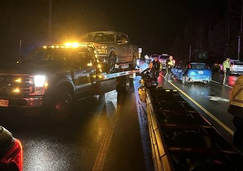 Vancouver Island BC Highway Patrol tows an impaired driver caught at a checkstop
