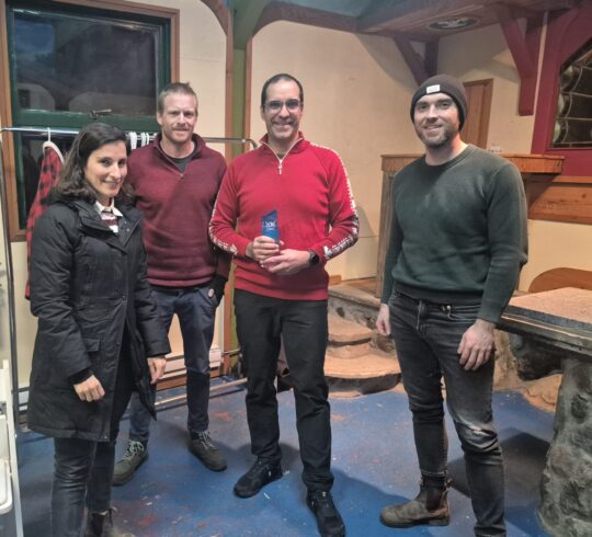 Tom Leson awards the courage award to participants of the tabletop discussion on Feb. 24. Photo: Sea to Sky Toastmasters