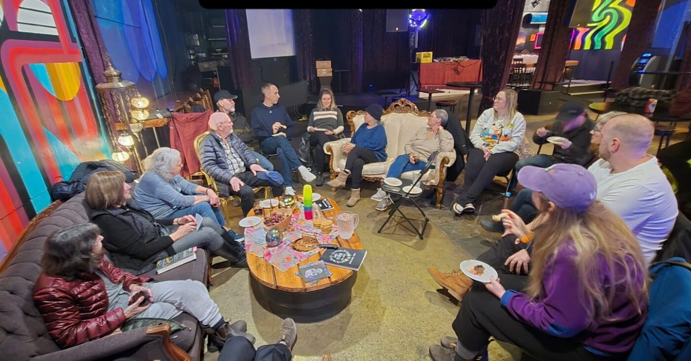 Attendees gather at Tricksters Hideout for Death Cafe Squamish, a free community event where participants are invited to talk openly about death.